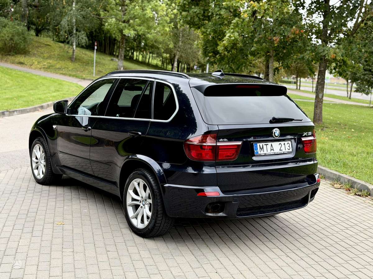BMW X5 2009 — фото 6