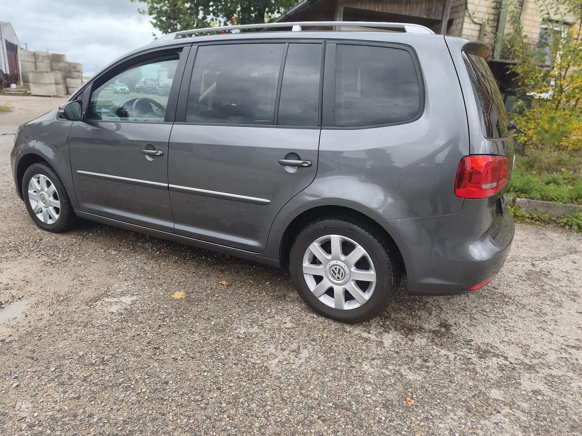Volkswagen Touran 2014 — двигун 1968 cm³, 177 HP (130kW)