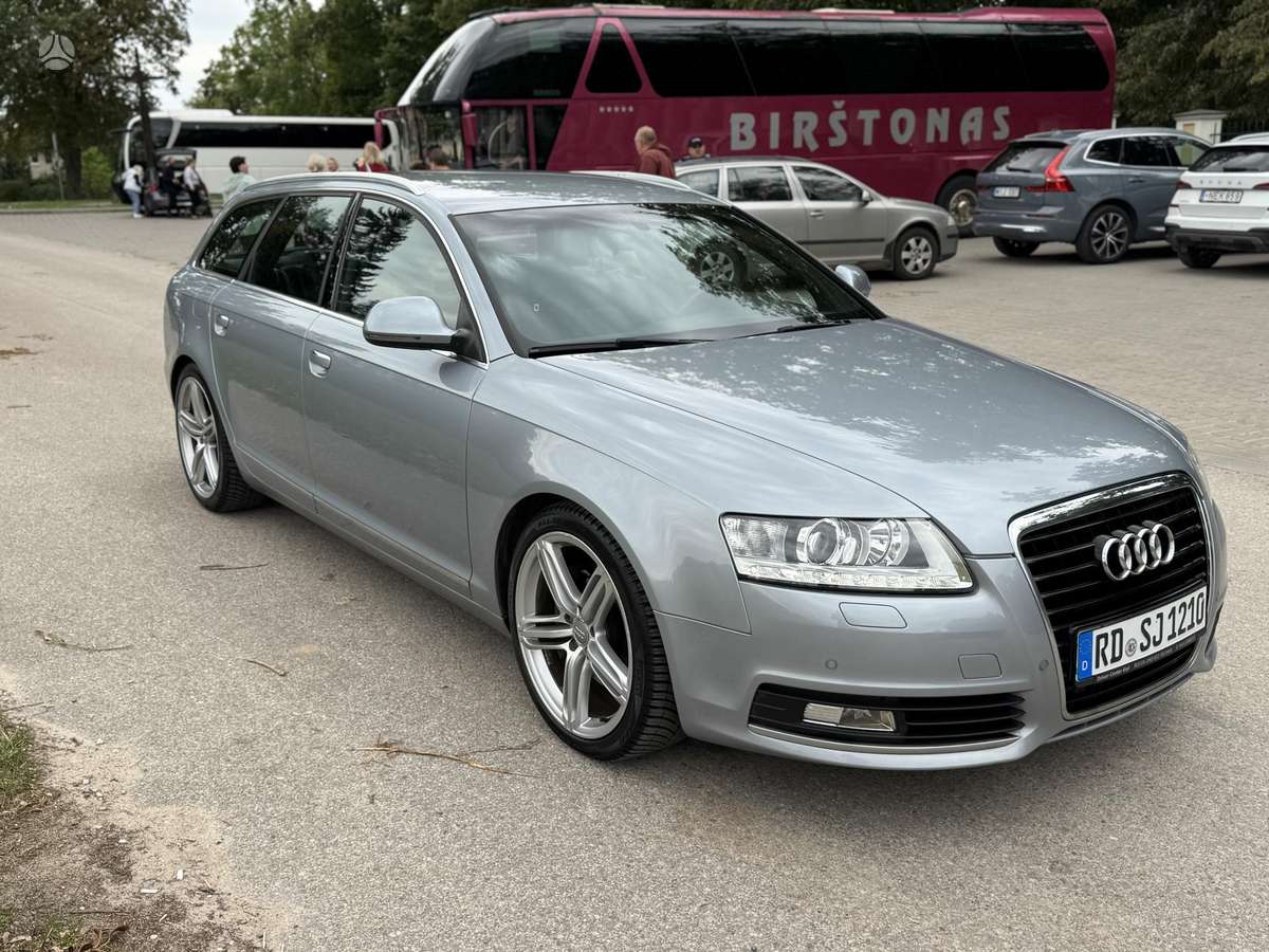 Audi A6 2011 — салон