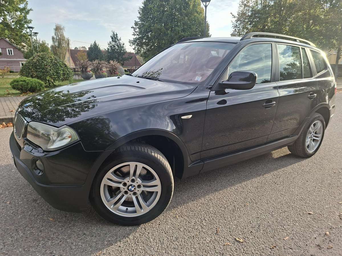 BMW X3 2009 — rear view