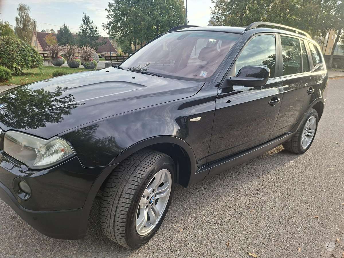 BMW X3 2009 — interior