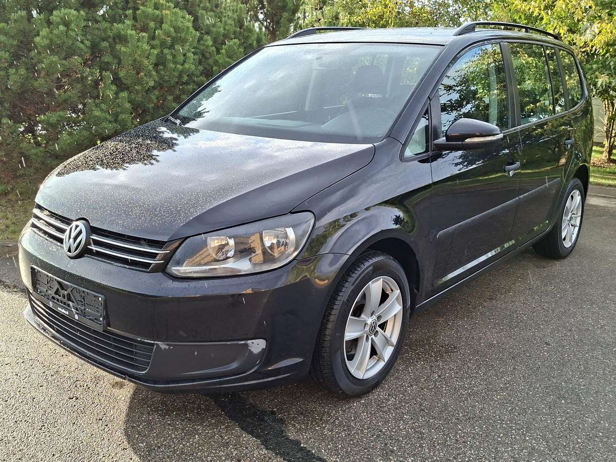 Volkswagen Touran 2011 — engine 1598 cm³, 105 HP (77kW)
