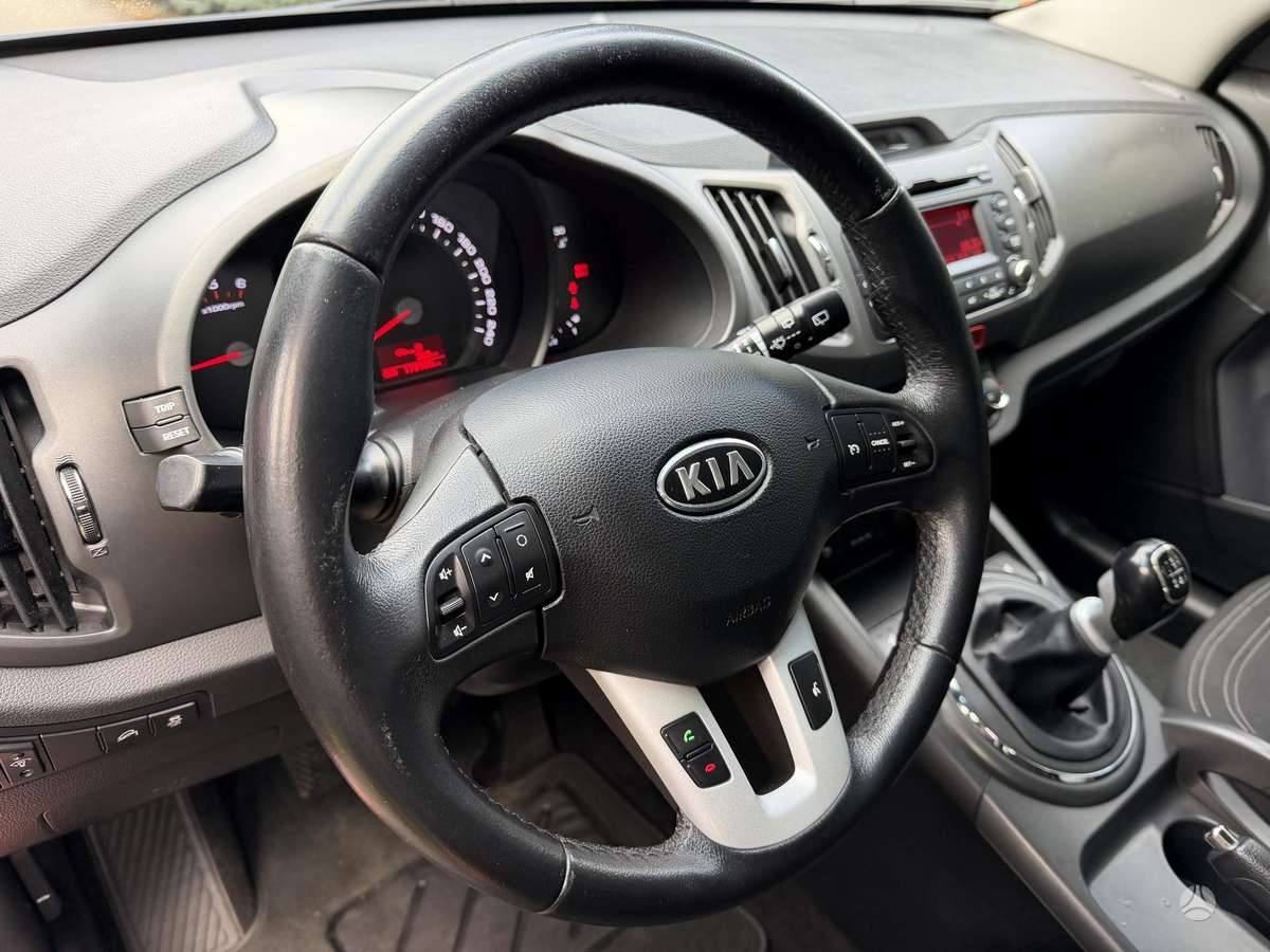 Kia Sportage 2011 — фото 11