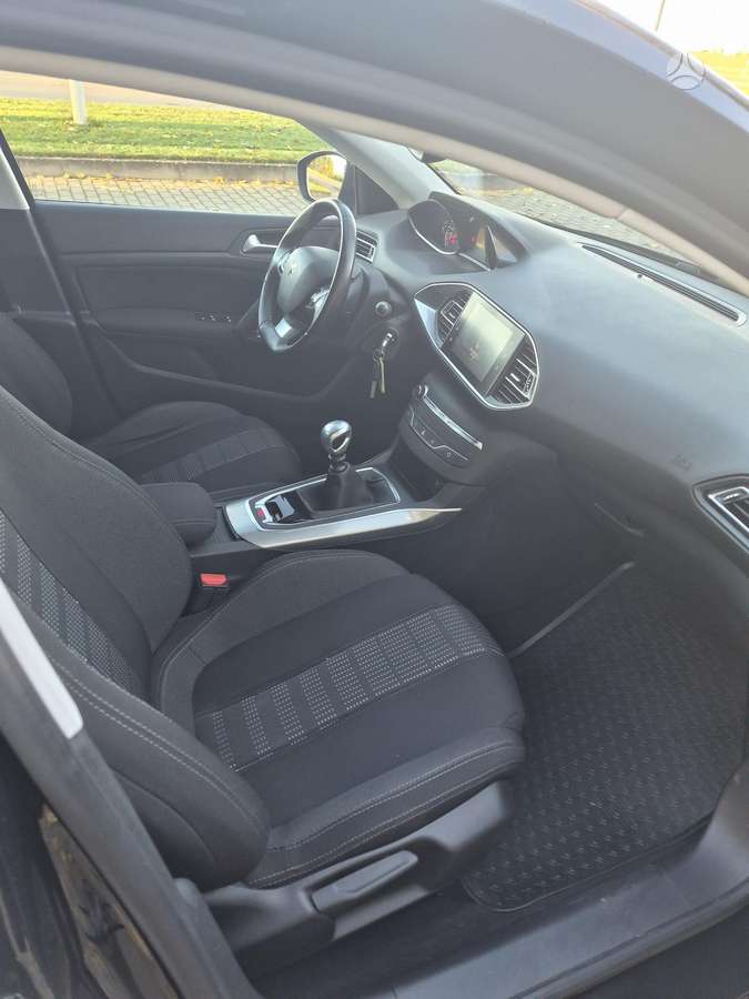 Peugeot 308 2015 — photo 16