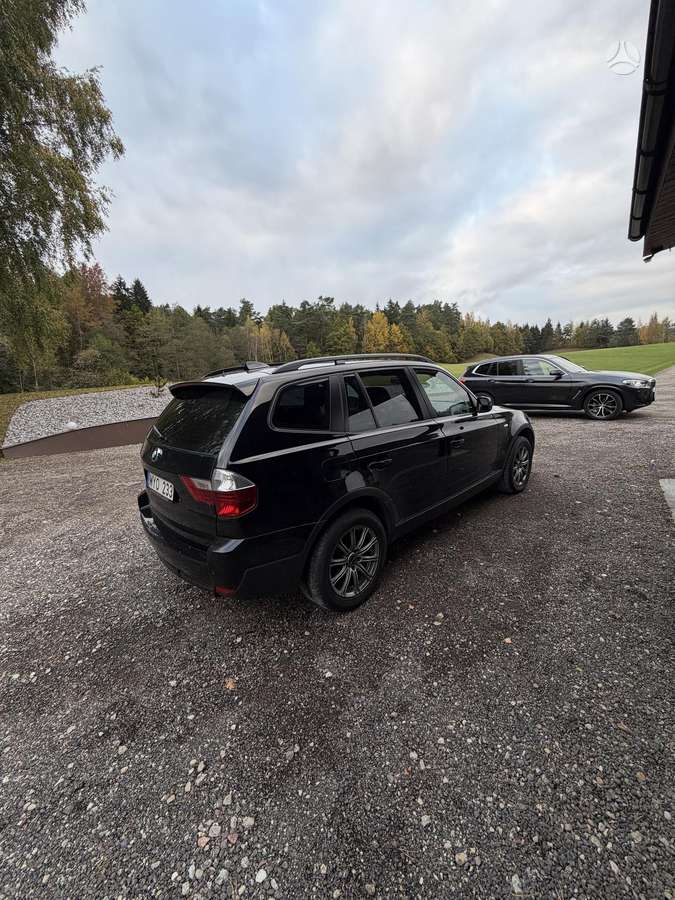BMW X3 2009 — rear view