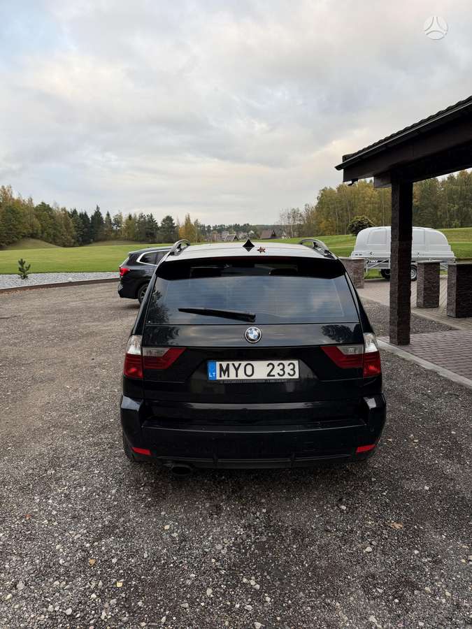 BMW X3 2009 — interior