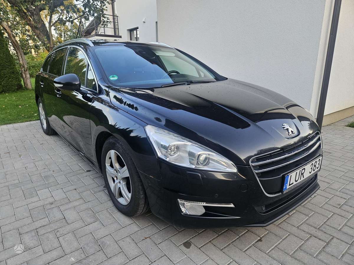 Peugeot 508 2014 — вигляд ззаду