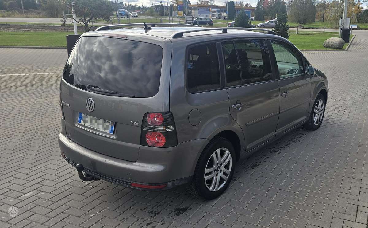 Volkswagen Touran 2009 — engine 1896 cm³, 105 HP (77kW)