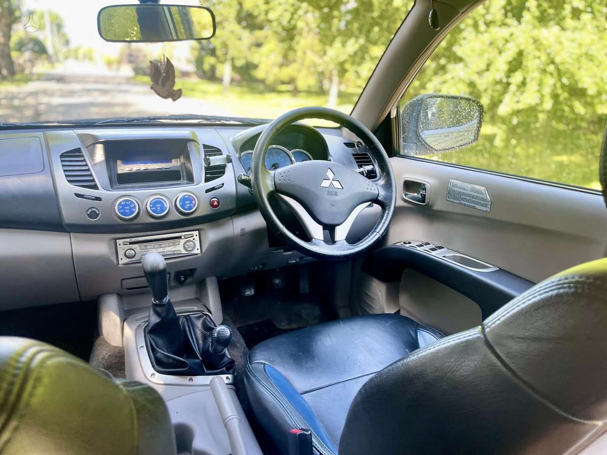 Mitsubishi L200 2007 — photo 9