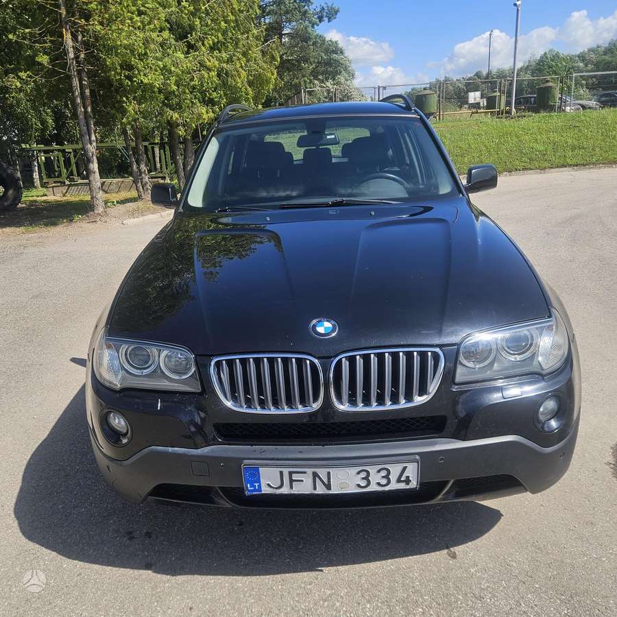 BMW X3 2009 — rear view