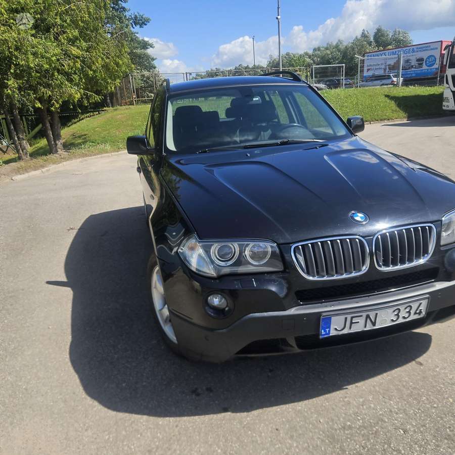 BMW X3 2009 — interior