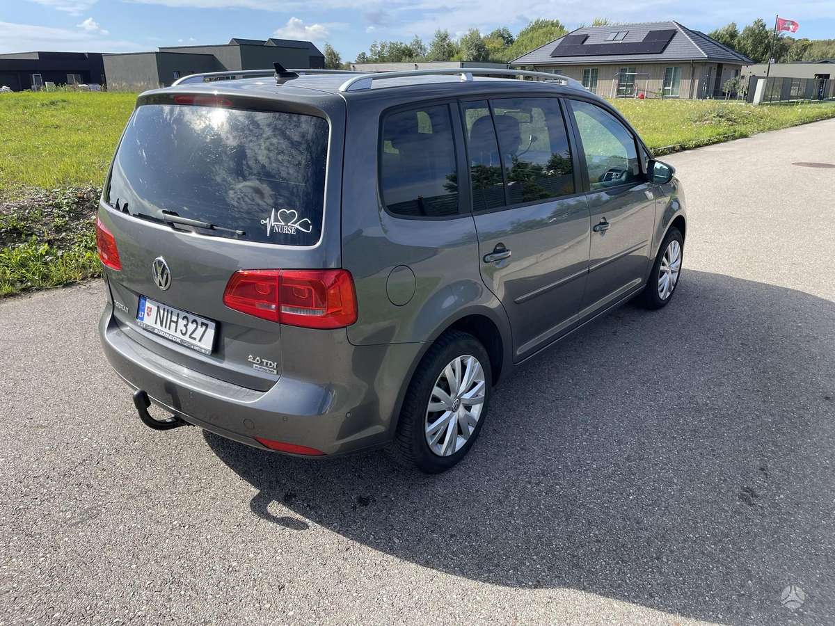 Volkswagen Touran 2013 — engine 2000 cm³, 140 HP (103kW)