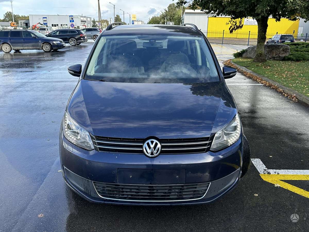 Volkswagen Touran 2013 — engine 1598 cm³, 105 HP (77kW)