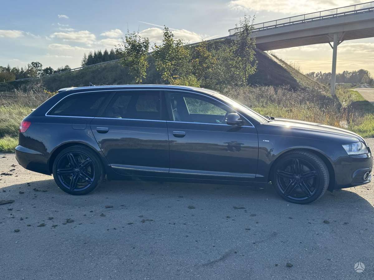Audi A6 2010 — engine 3000 cm³, 239 HP (176kW)
