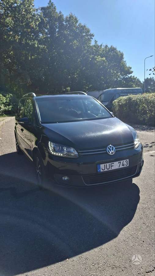 Volkswagen Touran 2014 — вигляд ззаду