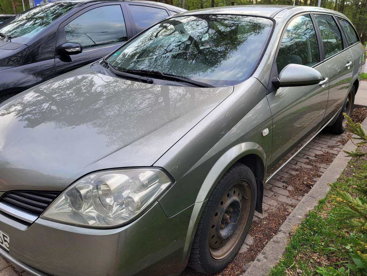 Nissan Primera 2005 — rear view