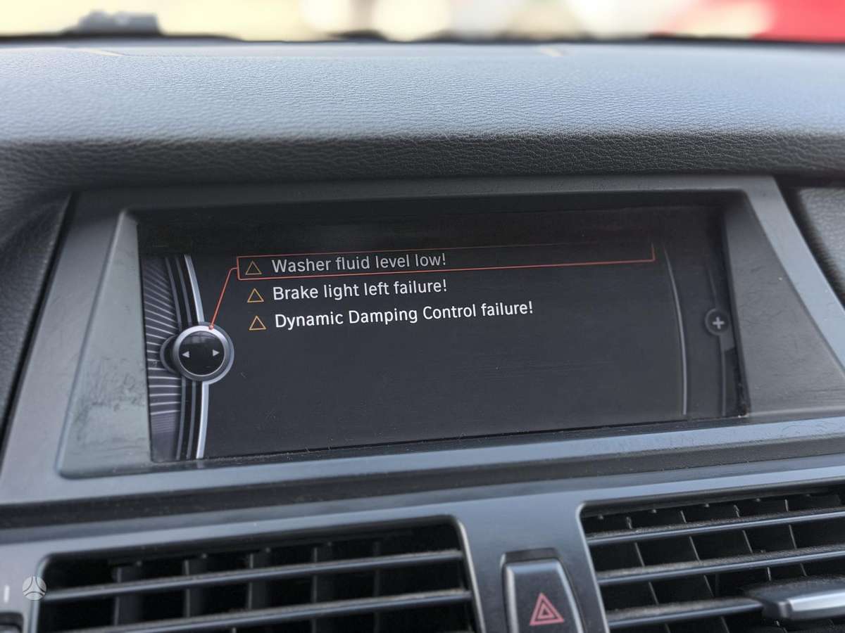 BMW X5 2010 — photo 20