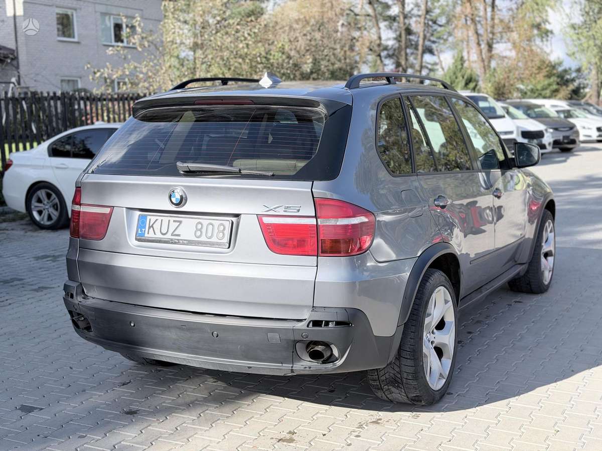 BMW X5 2010 — engine 2993 cm³, 235 HP (173kW)