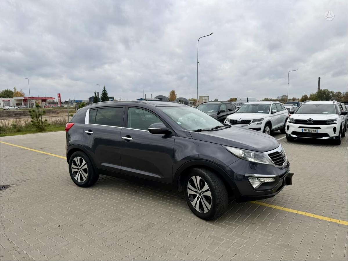 Kia Sportage 2014 — engine 1685 cm³, 116 HP (85kW)