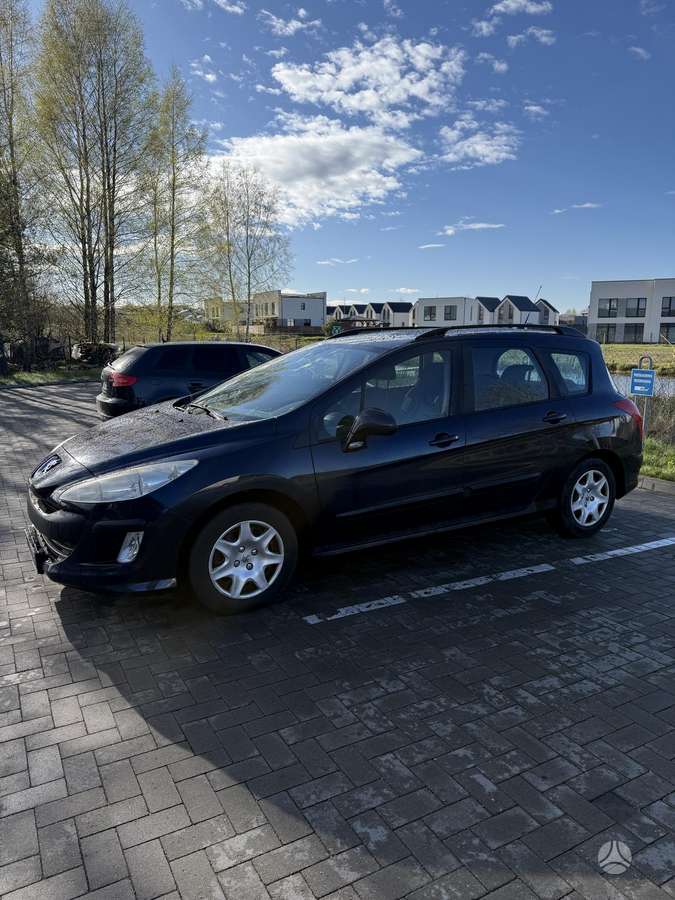 Peugeot 308 2011 — салон