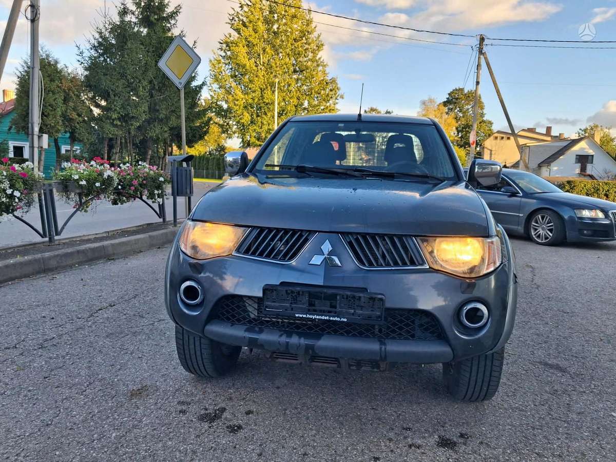 Mitsubishi L200 2006 — photo 7