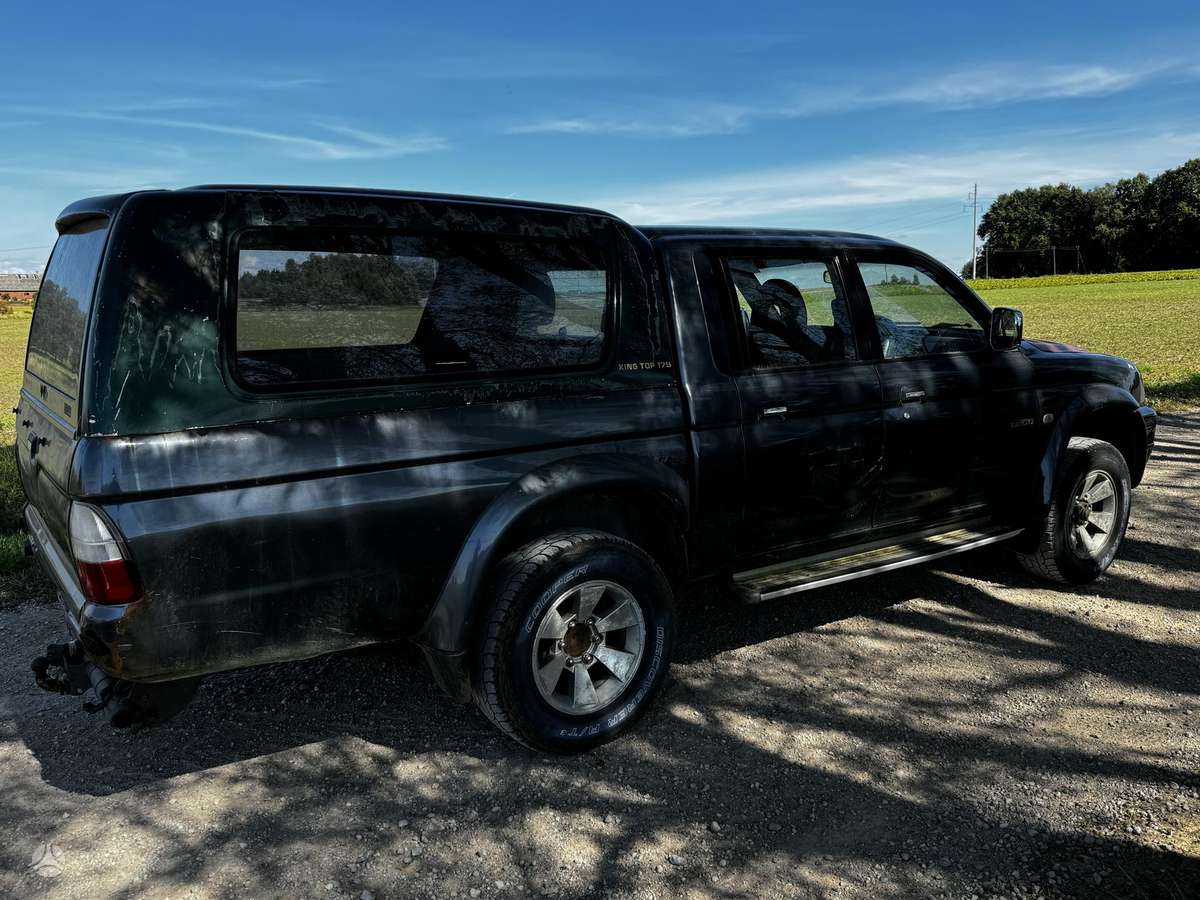 Mitsubishi L200 2005 — двигун 2477 cm³, 116 HP (85kW)