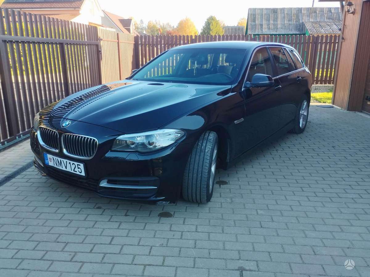 BMW 518 2013 — rear view