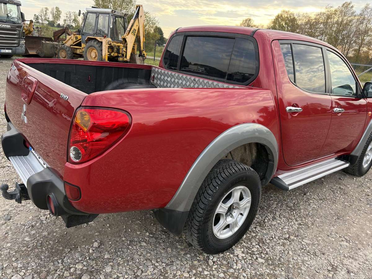 Mitsubishi L200 2008 — photo 11