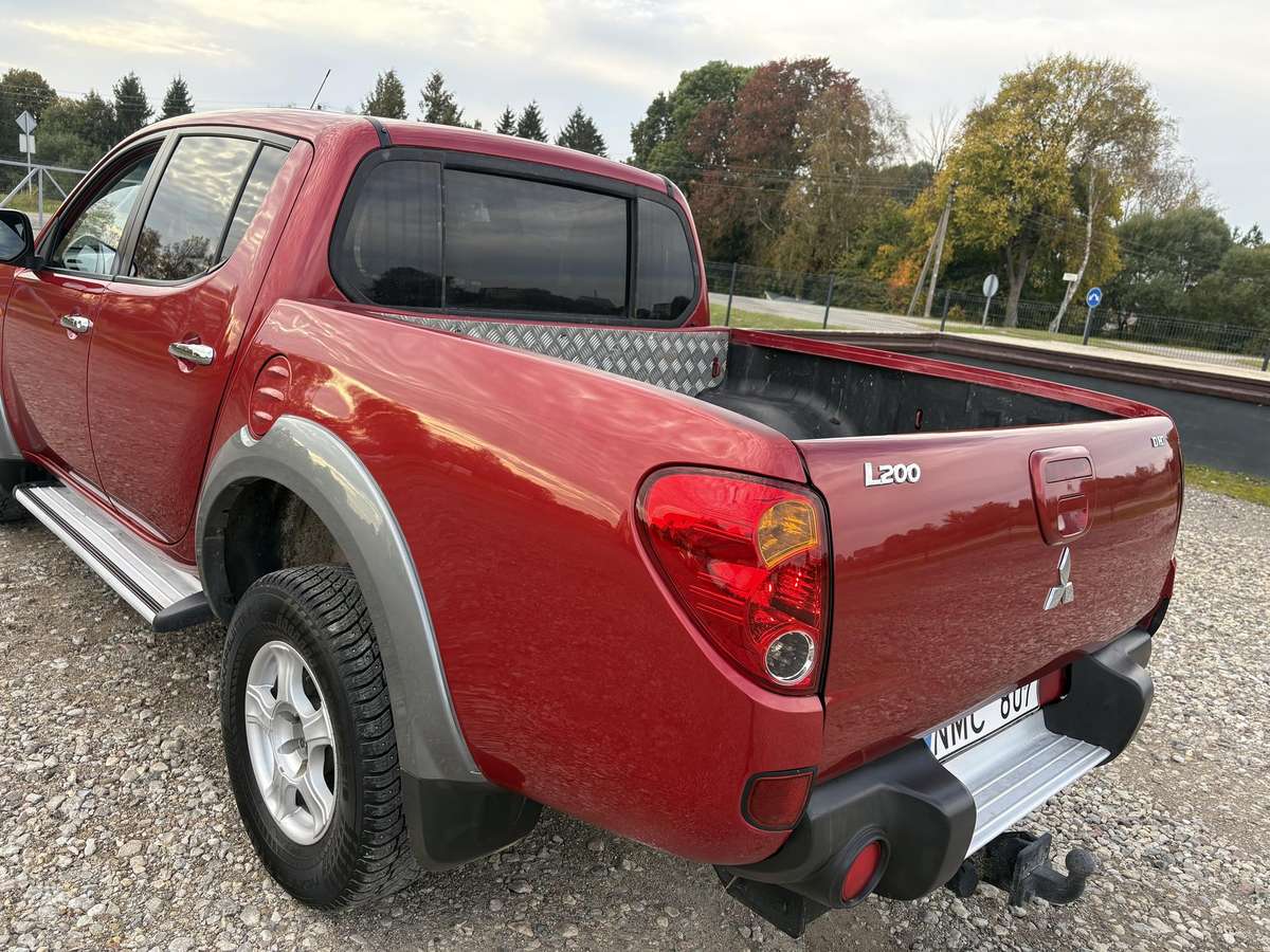 Mitsubishi L200 2008 — photo 12