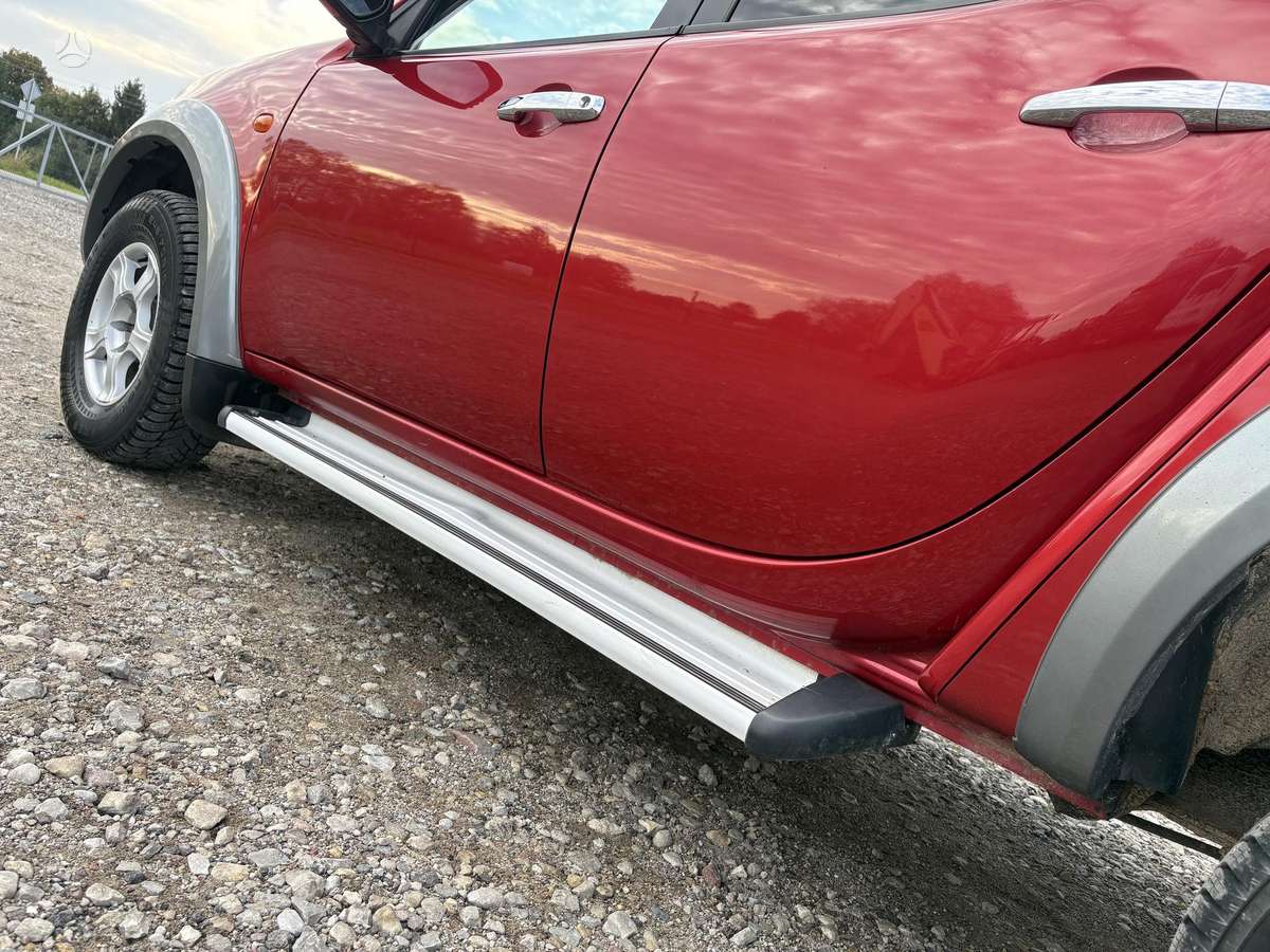Mitsubishi L200 2008 — photo 13