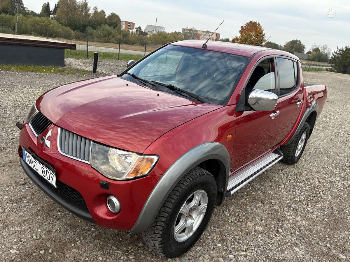 Mitsubishi L200 2008 — photo 15