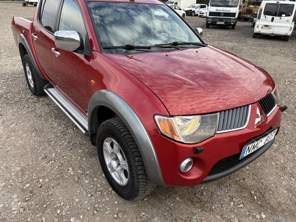Mitsubishi L200 2008 — photo 16