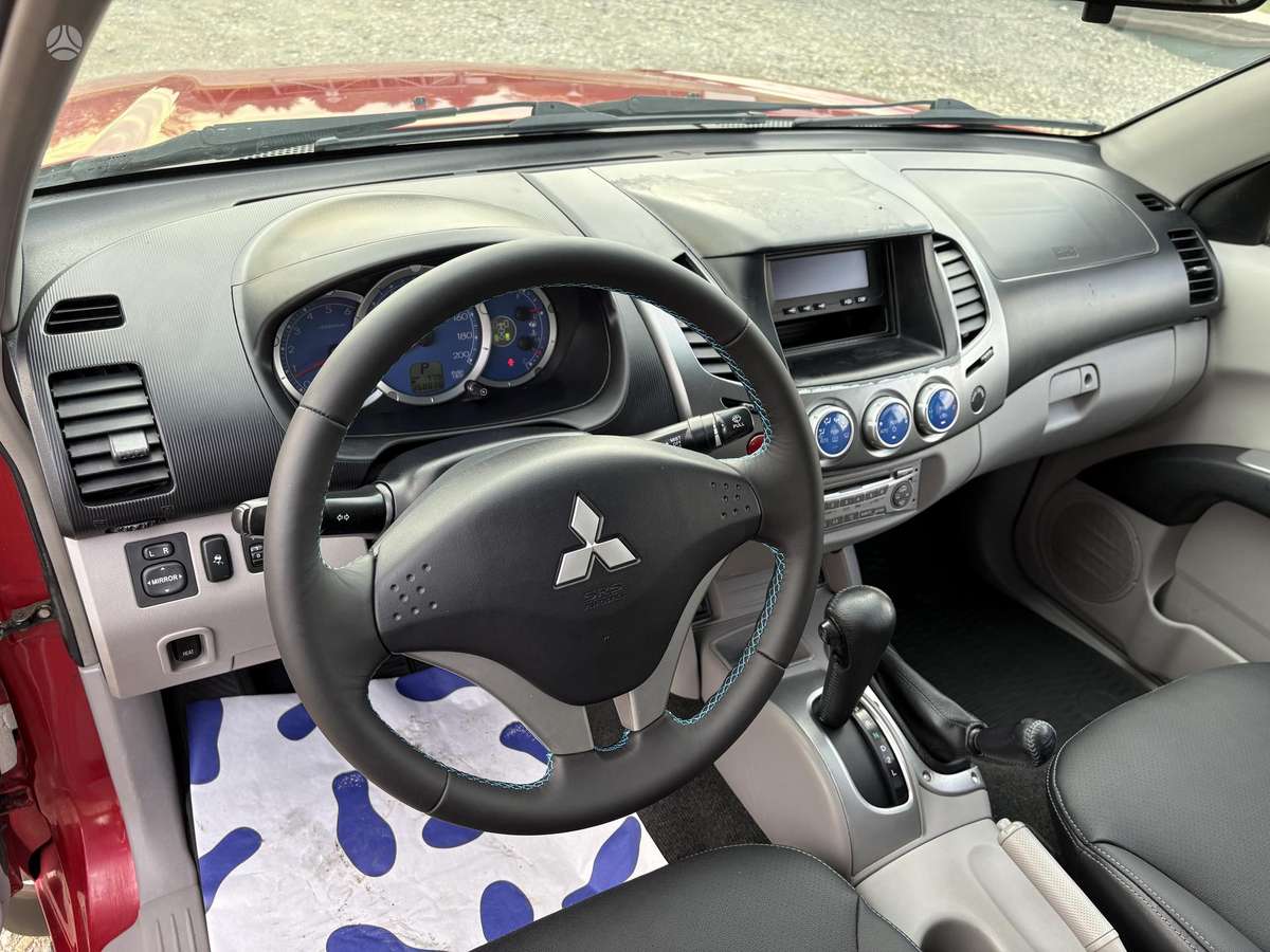 Mitsubishi L200 2008 — photo 23