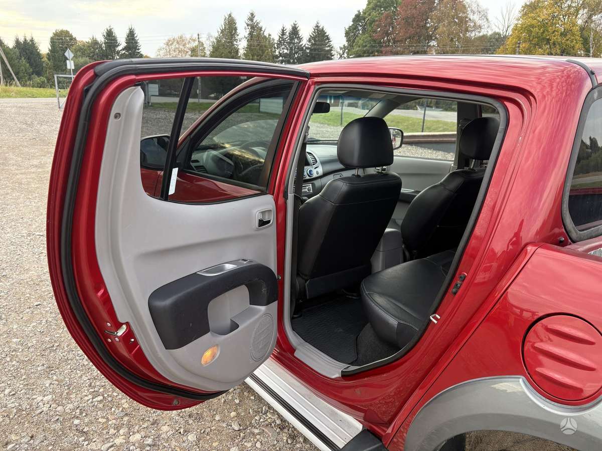 Mitsubishi L200 2008 — photo 27