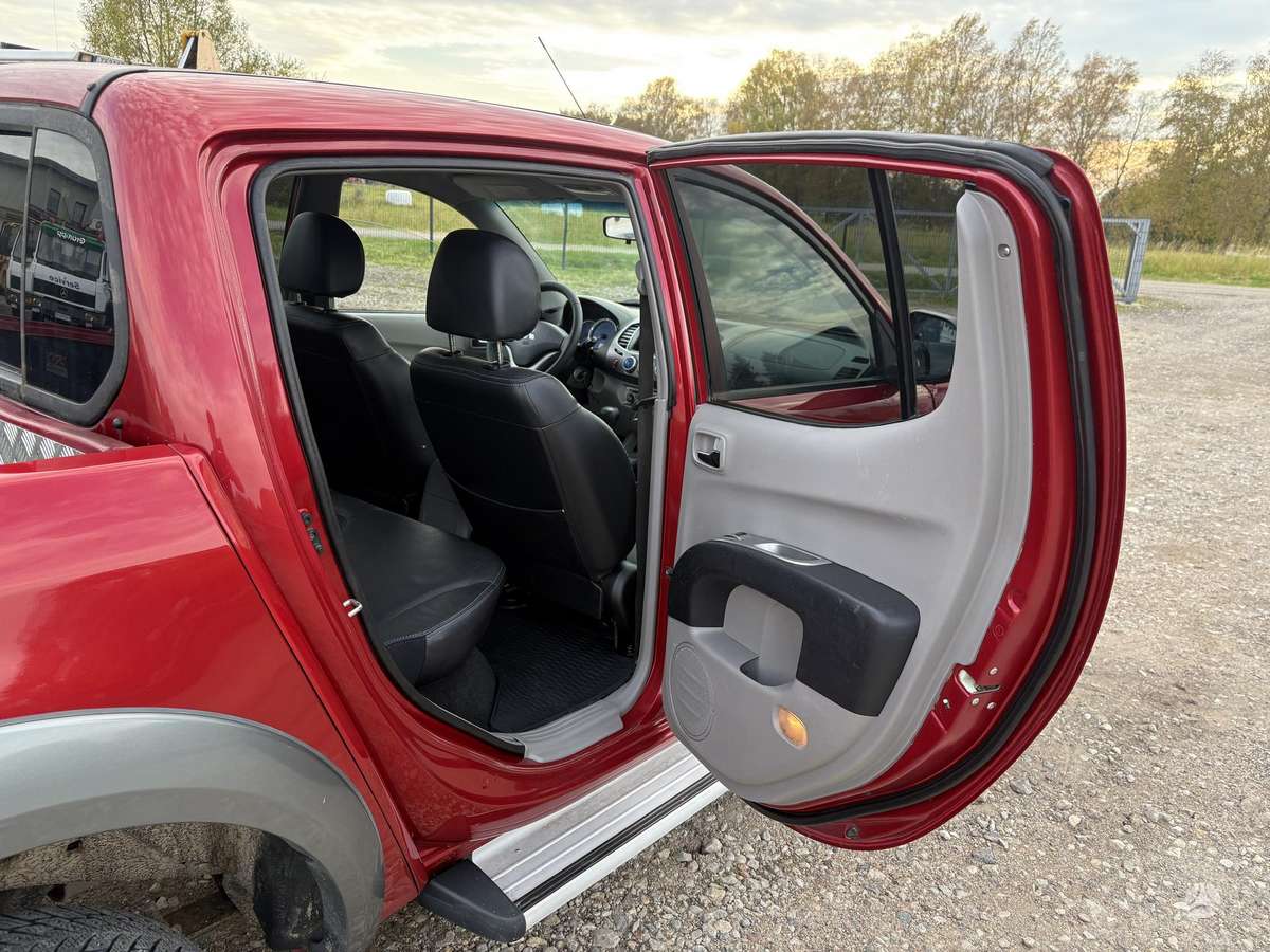 Mitsubishi L200 2008 — photo 30