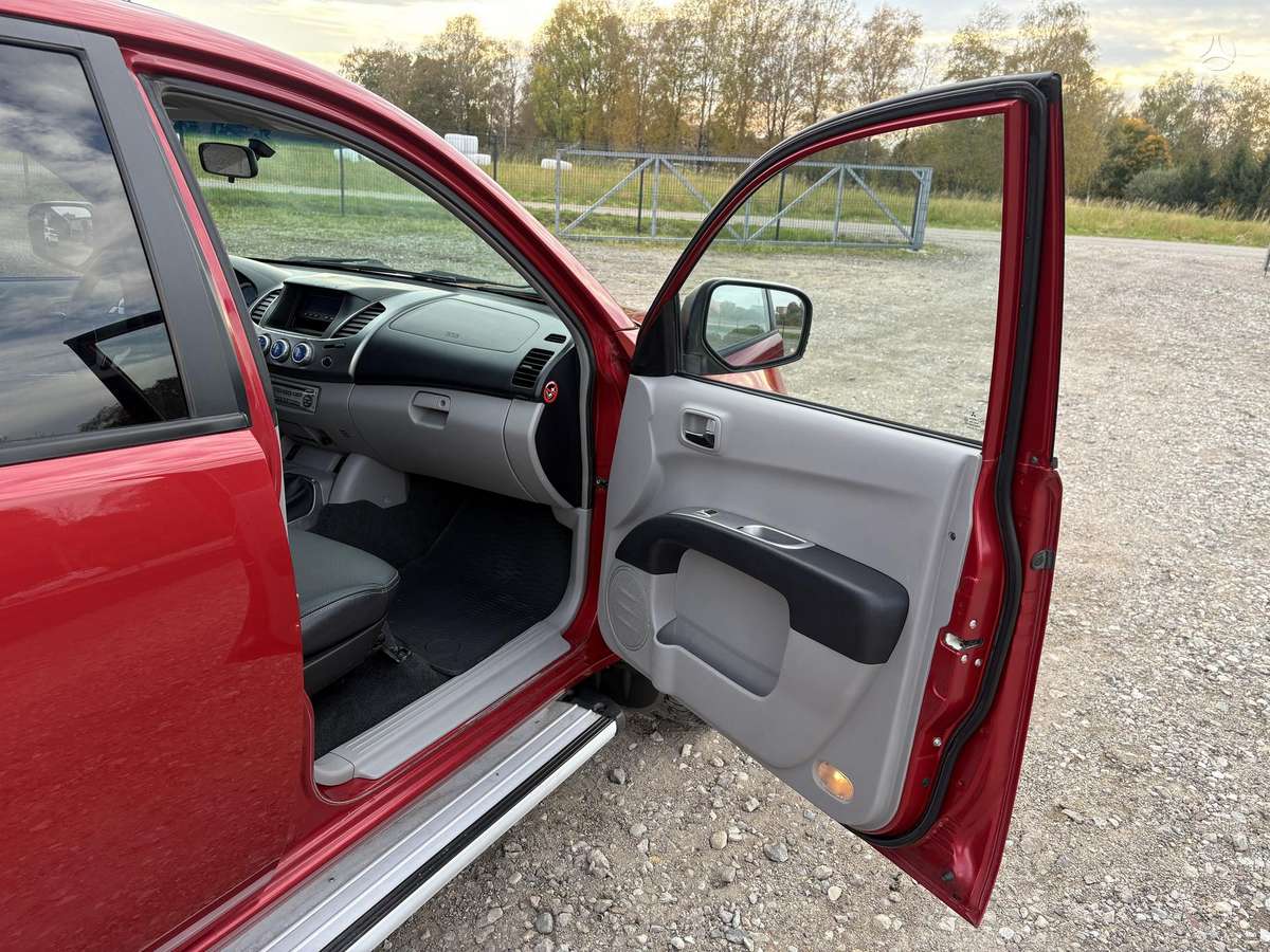 Mitsubishi L200 2008 — photo 32