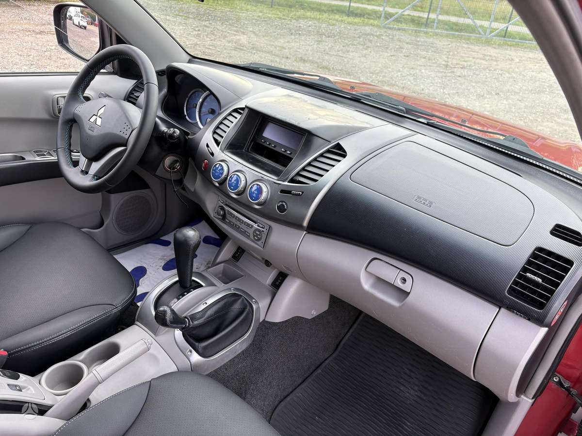 Mitsubishi L200 2008 — photo 35