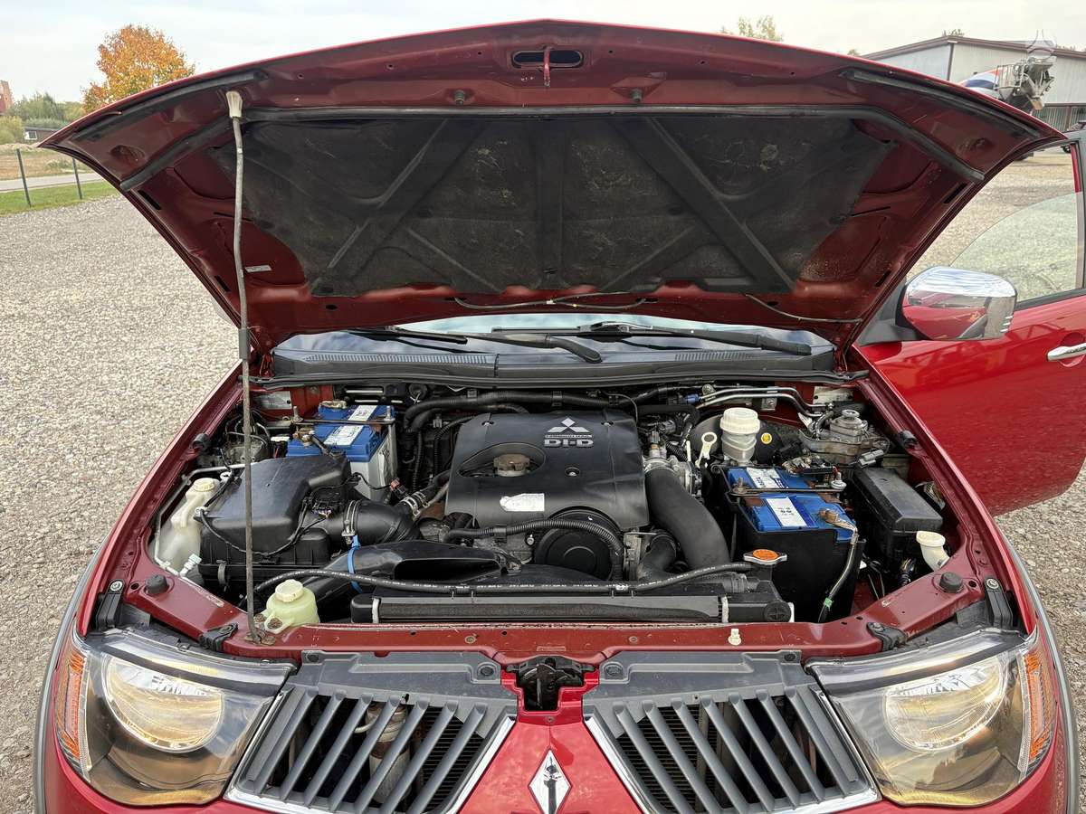 Mitsubishi L200 2008 — photo 41