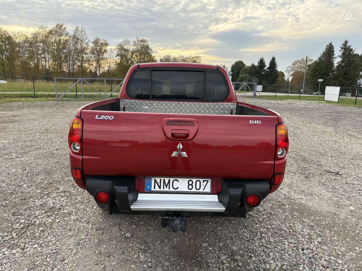 Mitsubishi L200 2008 — photo 6