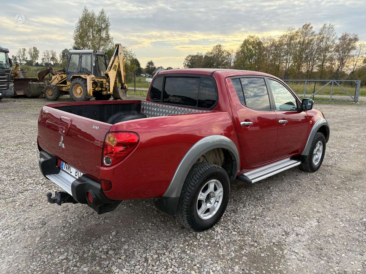 Mitsubishi L200 2008 — photo 7
