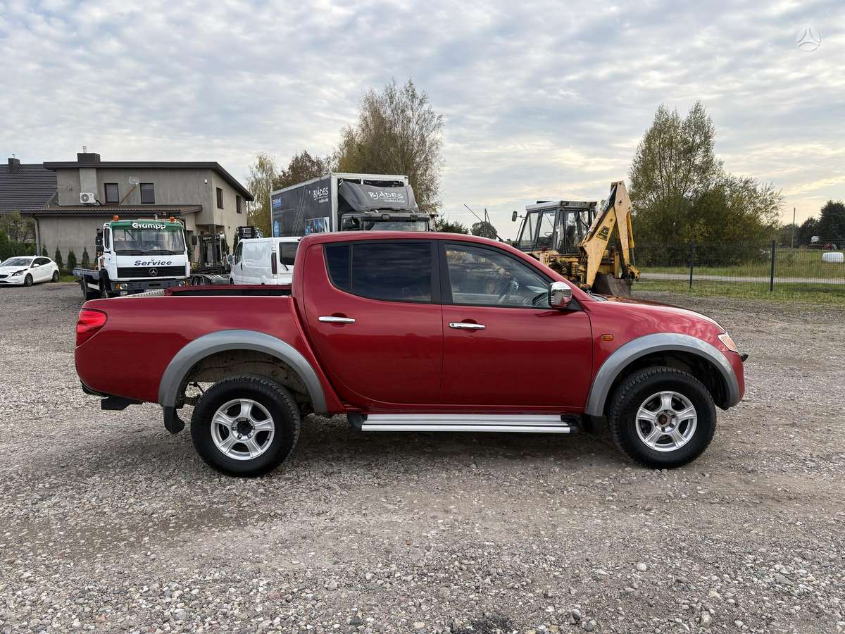 Mitsubishi L200 2008 — photo 8