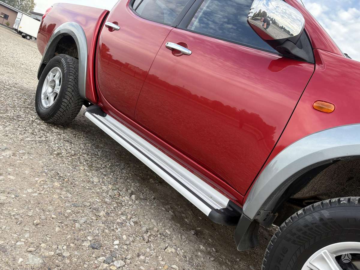 Mitsubishi L200 2008 — photo 9