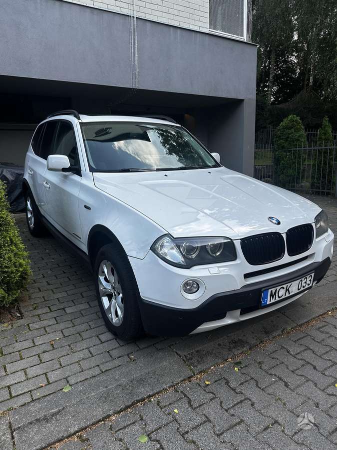 BMW X3 2009 — rear view