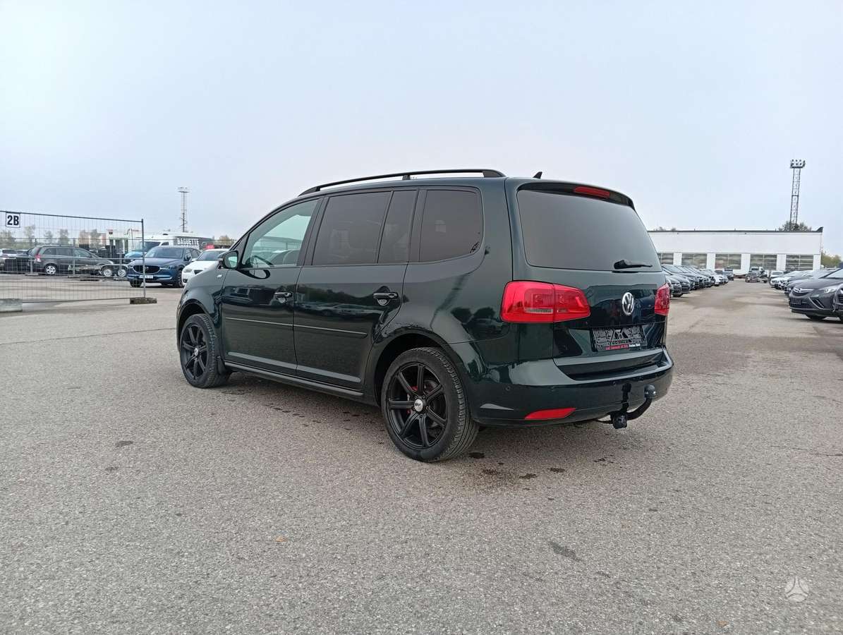 Volkswagen Touran 2014 — engine 1598 cm³, 105 HP (77kW)