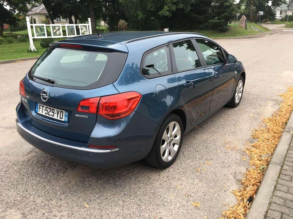 Opel Astra 2014 — engine 1248 cm³, 95 HP (70kW)