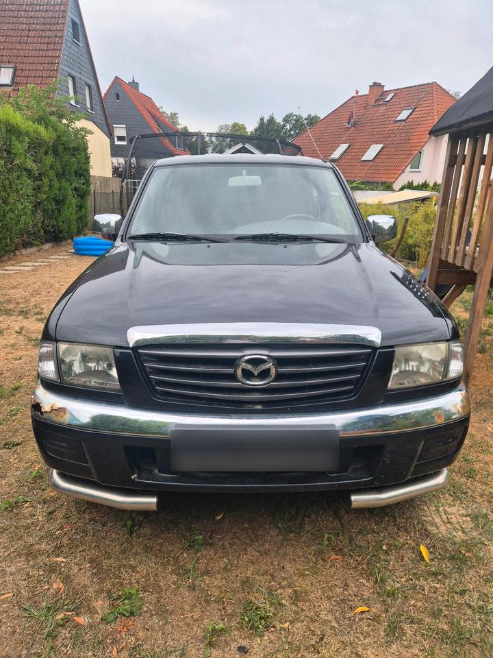 Mazda B series 2004 — rear view