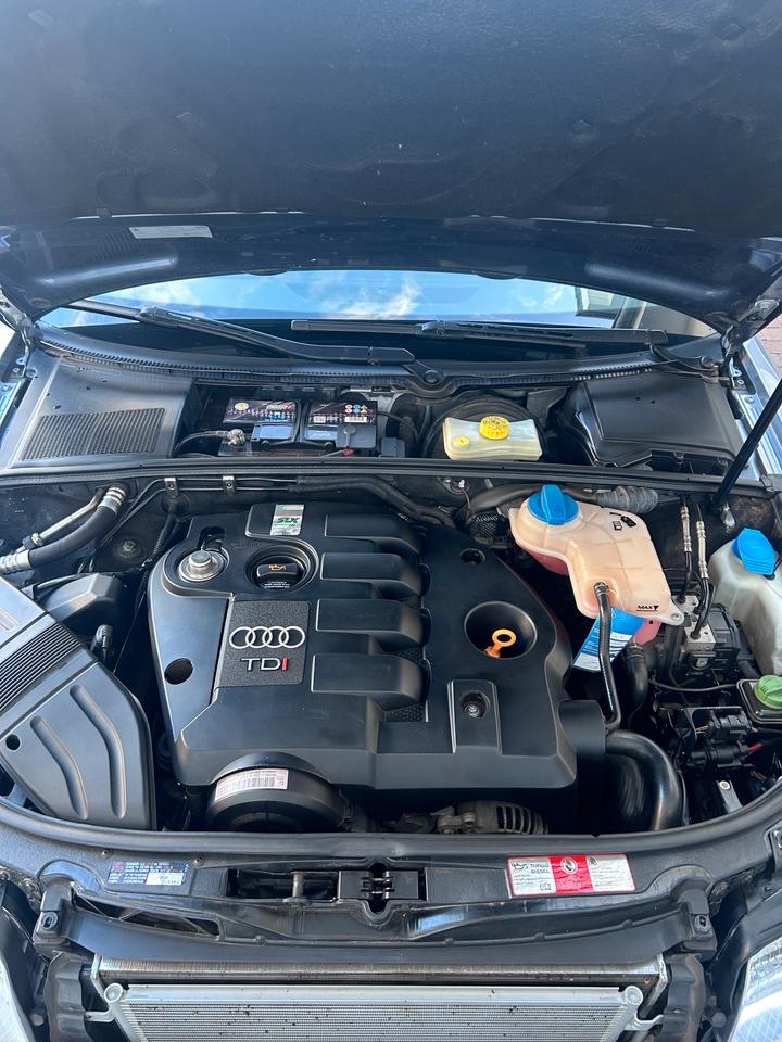 Audi A4 2004 — photo 18