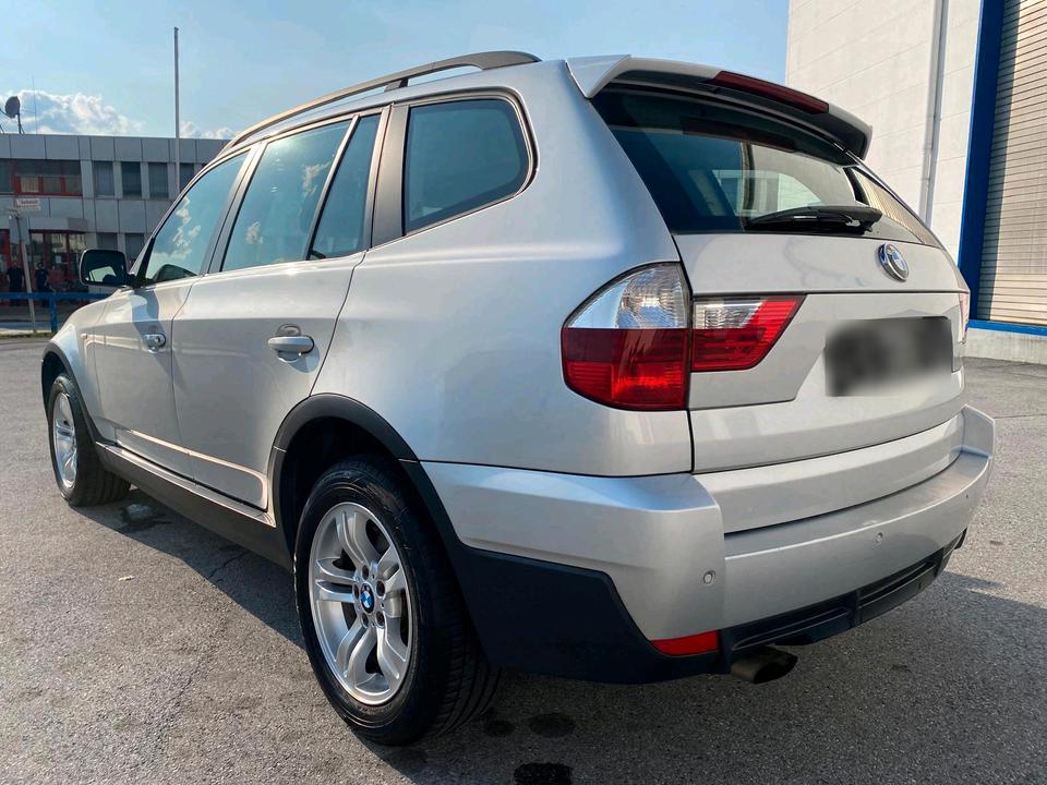 BMW X3 2009 — interior