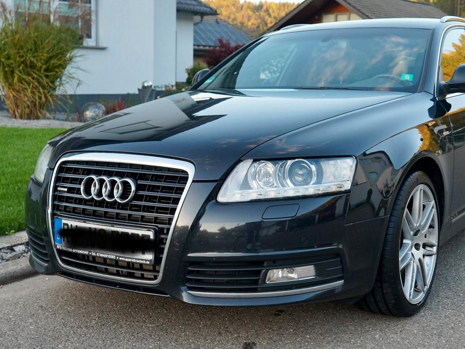 Audi A6 2011 — салон