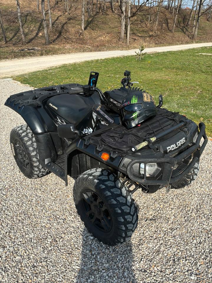 Weitere Motorräder Polaris Sportsmann 850 2009 — rear view